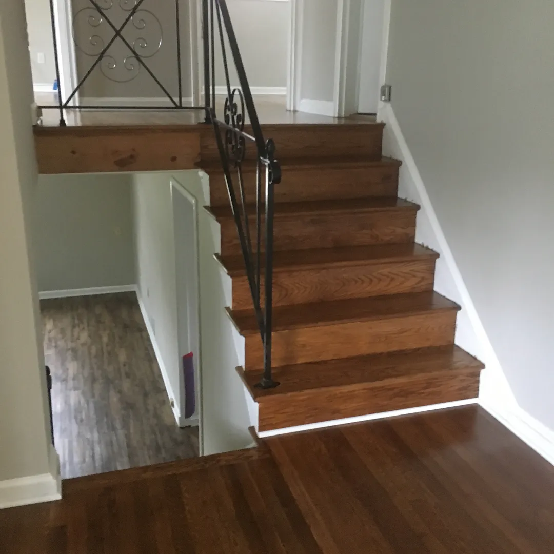 Staircase flooring solutions: elevating your maryland home's entryway 2 20766467 514440682232886 4661533327260385280 n 78047c9584f978c44b81